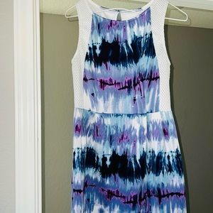 Multi colored, sleeveless, mini dress. Only worn once.